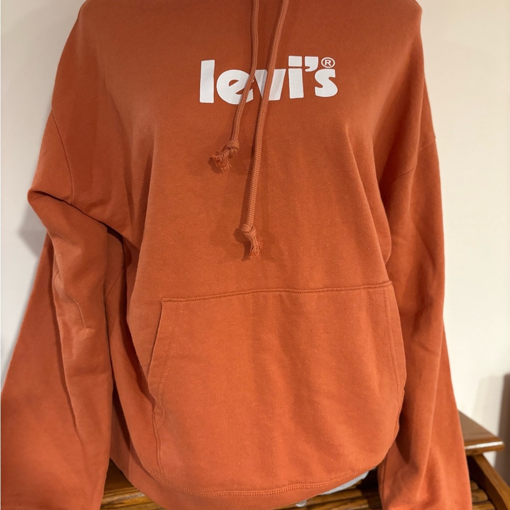 Levi's women’s pullover Orange Hooded Sweatshirt size Large retail $59.50